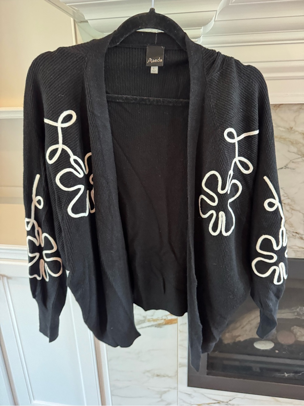 Aeeda Black Open-Front Cardigan with White Floral Rope Detail